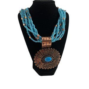Turquoise Colored Necklace Multistrand Beaded Large Copper Colored Pendant 25"